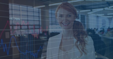Image of statistical data processing against portrait of caucasian woman smiling at office