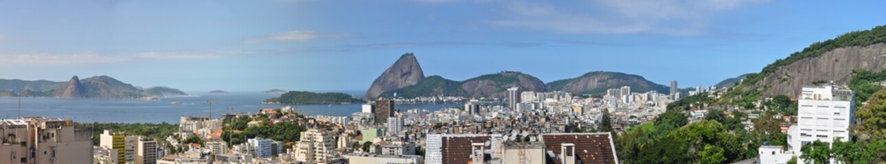 Fototapeta premium Wide panoramic view of Sugarloaf Mountain from Park of the Ruins, Santa Tereza neighborhood - Rio de Janeiro, Brazil