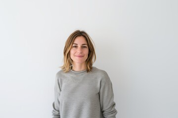 Obraz premium Smiling Woman in Gray Sweater. Generative AI.