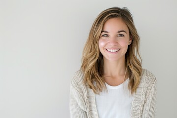 Obraz premium Smiling Woman in Beige Cardigan. Generative AI.