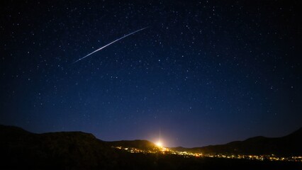 Obraz premium view of the night sky with stars and a bright light in the foreground