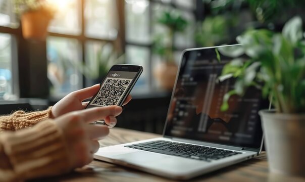 closeup of a hand holding phone and scanning qr code qr code payment and cash technology.image