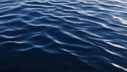 close up view of the surface of a body of water with ripples of water