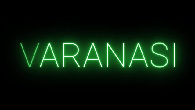 Flickering neon green glowing varanasi text animated on black background