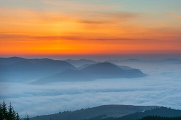 Dawn in the Ukrainian Carpathians with fog on the mountain slopes