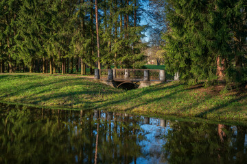 View of the alley with a bridge along the Upper Ponds in the Catherine Park of Tsarskoye Selo on a...