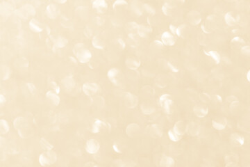 Golden beige cream orange bokeh glitter light shiny background. Wedding, Anniversary, Love, Romance, New Year and Celebration background concepts.