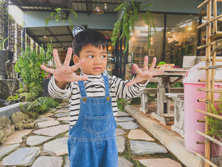 Portrait of a smiling boy, embodying joy and childhood happiness indoors