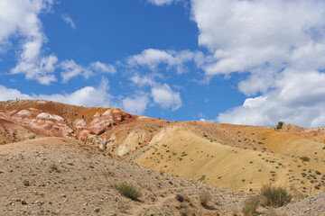 Painted hills on a sunny day. Nature of Mountain Altai. 