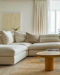 A white couch and coffee table in a living room.