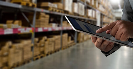 Businessman use smart tablet loading documents online Spreadsheet document financial data and graphs in spreadsheet documents for online analysis