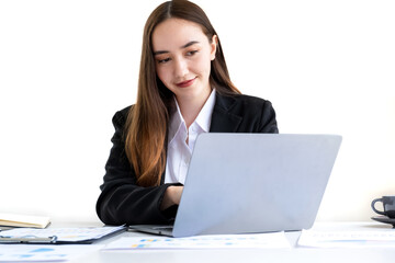 Businesswomen bookkeeper hand use laptop analysis the graph for Setting challenging business goals and ready to achieve target at home office