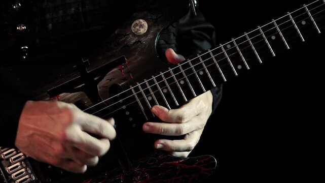CLOSE UP VIDEO OF GUITARIST PLAYING A SOLO. DETAIL AT YOUR HANDS