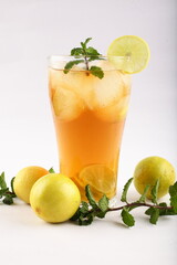 Fresh cold mint lime tea on white background