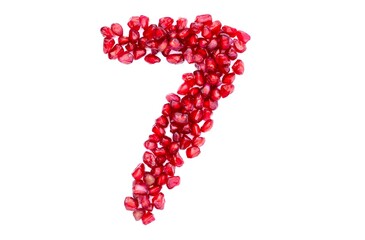 Seven or 7 Number Written with Pomegranate Seeds Isolated on White Background