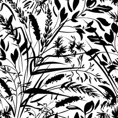 Hand drawn sketch of leaves and grass. Seamless pattern with black plants on a white background. Medical herbs and spice. Frame with wildflowers.

