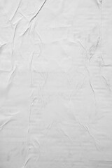 Vertical white crumpled paper poster texture background