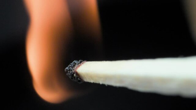 lighting match stick closeup view
