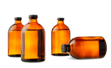 Four Amber Glass Bottles With Black Caps on a White Background