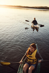 Couple, kayak and boat on river adventure for outdoor sports or nature travel trip. Man and woman...
