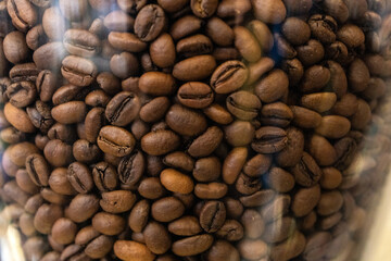 roasted coffee beans in the glass 