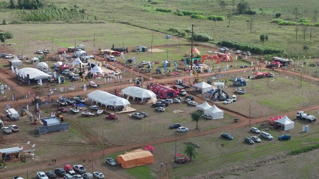 Tents and cars of merchants at the forest farmers market. Misiones Posadas Miguel Lanús. Argentina