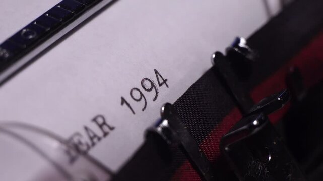 Year 1994, Typing on Blank White Paper in Vintage Typewriter, Close Up