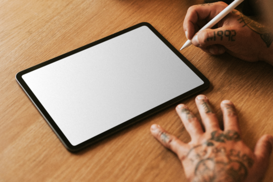Tablet screen mockup png on a wooden desk