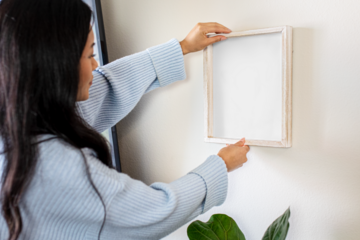 Picture frame mockup png, transparent space, on white wall