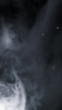 Black background with thick smoke. Design. Bright shiny colored smoke in animation spreading throughout the dark footage.