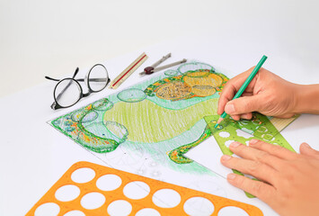 Garden design courses student is learning fundamentals garden design and planning.