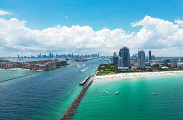 Obraz premium Summer in Miami . Miami beach coastline. Panoramic view of Luxury condos in Miami Beach Florida. Aerial View of Surfside Miami Beach.