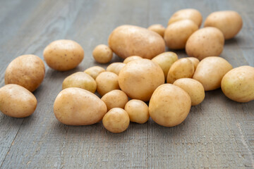 Fresh Potatoes on Wooden Table, Natural Rustic Setting, Organic Produce Photography