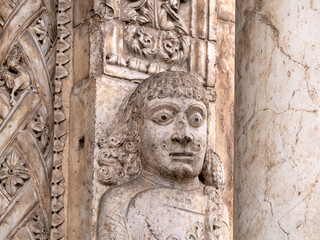 Verona dome cathedral church exterior sculptures detail. Romanesque sculpture attributed to the workshop of Veronese sculptor Brioloto