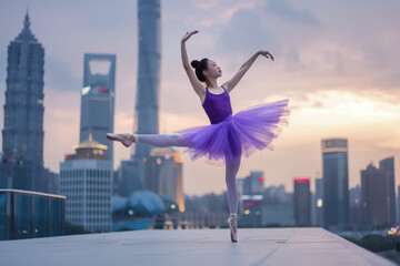 Ballerina in a purple tutu performing a dance pose on a rooftop with a city skyline at dusk. Graceful movement and urban backdrop highlighting elegance and modernity