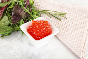 Red caviar in the bowl