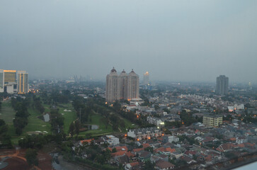 Obraz premium The skyline of Jakarta, Indonesia showing the air pollution endemic in the city