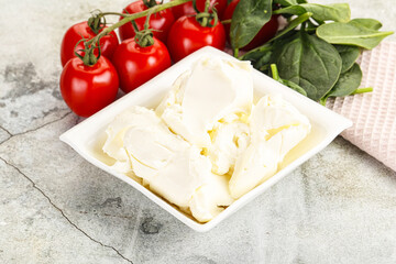 Soft cream cheese in the bowl