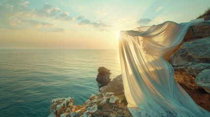 The cliffside becomes a stage for the dramatic performance of flowing fabric evoking emotions of both awe and tranquility.