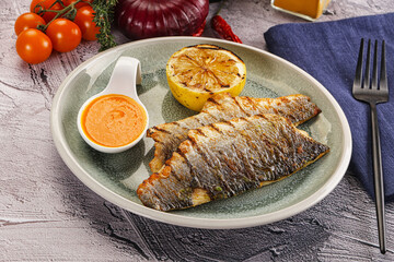 Grilled seabass fillet with lemon