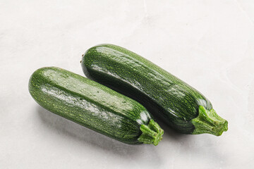 Raw green ripe zucchini vegetable