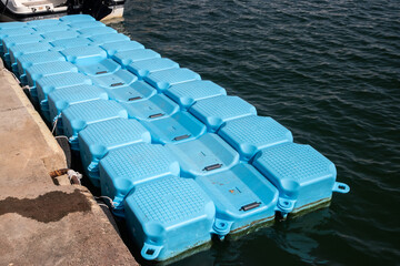 Plastic Modular Floating Dry Dock for Boats closeup on sunny day
