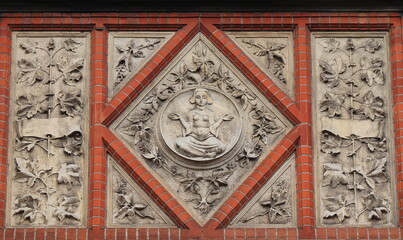 Amsterdam Stedelijk Museum Facade Sculpted Detail Depicting a Sitting Woman, Netherlands