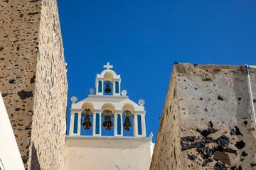 Santorini - Greece - May 17, 2024: A tipycal bell tower, Santorini, Cycladic Islands, Greece.