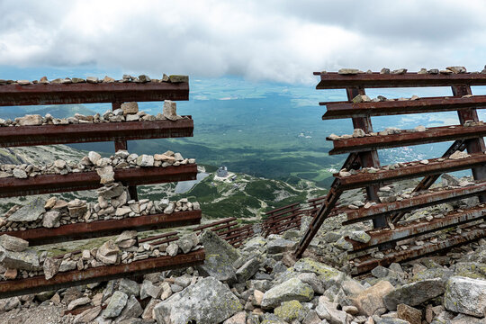 Avalanche barrier on the top of the mountain in the High Tatras in the summer season