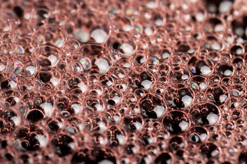 foam in a glass of pomegranate juice