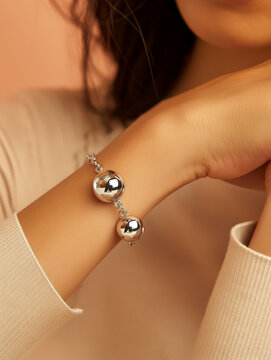 Delicate screwball bracelet, handcrafted in gleaming silver. Minimalist design, perfect for everyday elegance.
