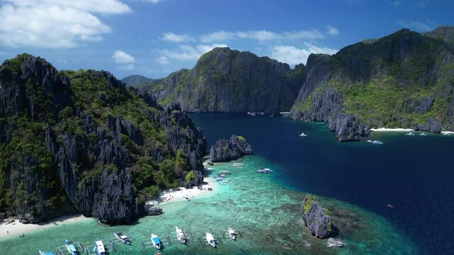 Aerial footage of the scenic Shimizu Island on a sunny day in El Nido, Palawan, Philippines