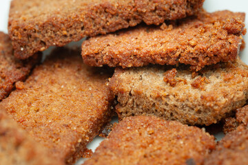 Fried pieces of bread close-up. Bread rusks. Selective focus