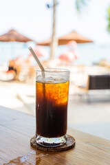 Black coffee, Americano in a cafe by the sea, Sue Flamingo, Ao Yon Beach, Phuket Thailand